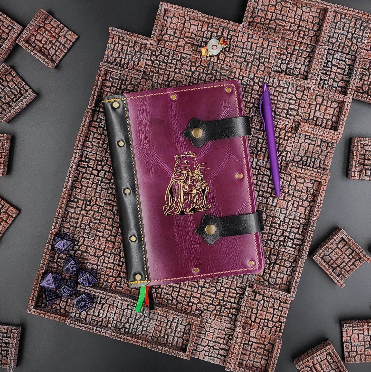 Handmade A5 leather adventure journal with hand-gilded hamster paladin in plate armor design by Grimbeard Leather