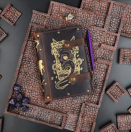 Handmade A5 leather adventure journal with hand-gilded Mimic gaping mouth design by Grimbeard Leather