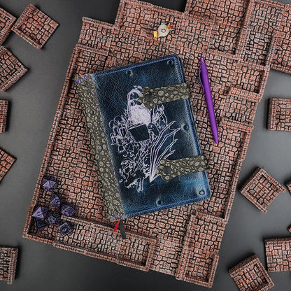 Handmade A5 leather adventure journal with hand-gilded wizard, dragon, and potion bottle design by Grimbeard Leather