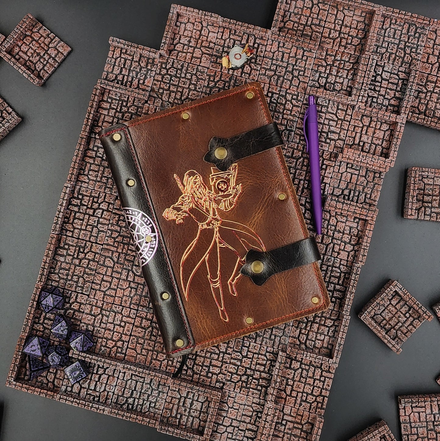 Handmade A5 leather adventure journal with hand-gilded anime style arcane mage casting a spell design by Grimbeard Leather
