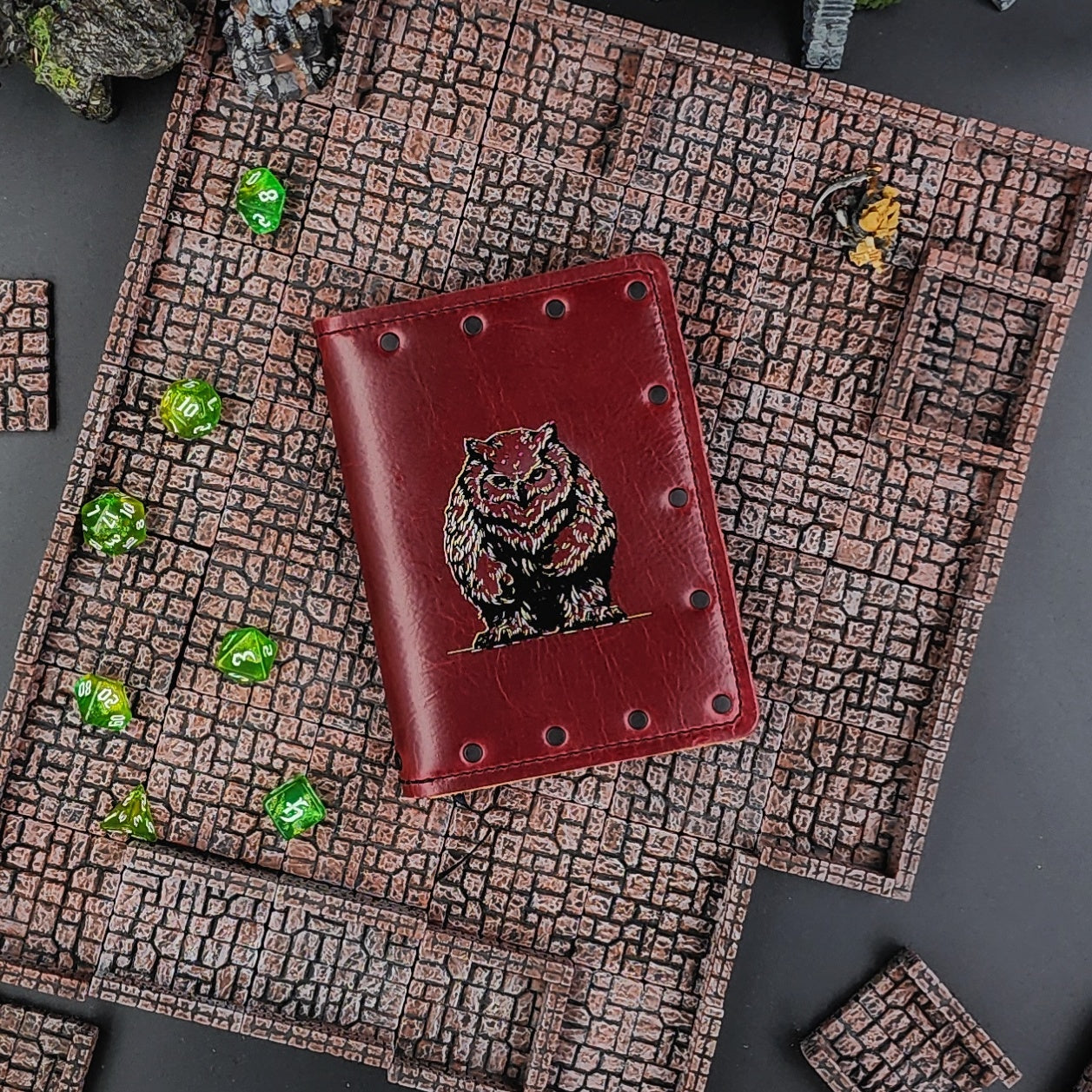 Custom handmade leather pocket journal with D&D inspired Owlbear forest predator design by Grimbeard Leather