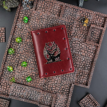 Custom handmade leather pocket journal with D&D inspired Owlbear forest predator design by Grimbeard Leather