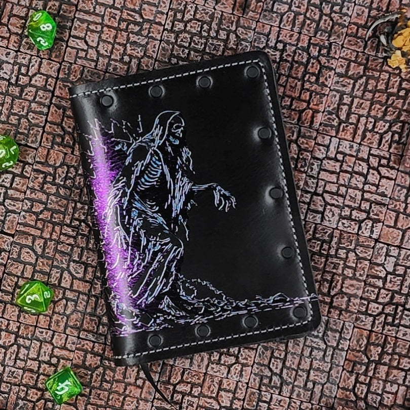 Custom handmade leather pocket journal with Acererak the Lich walking out of a wall design from Tomb of Horrors by Grimbeard Leather