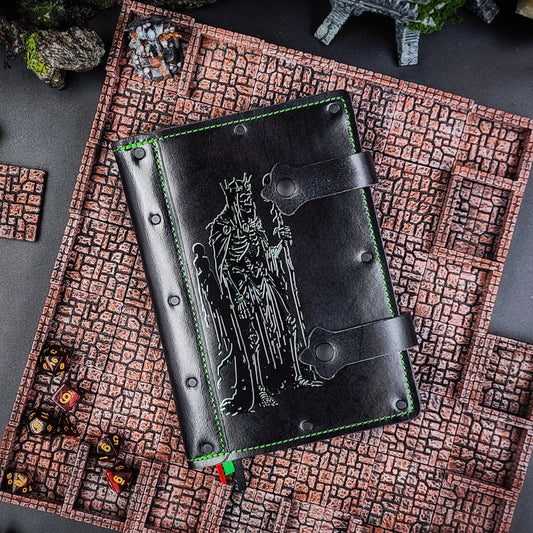 Handmade A5 leather adventure journal featuring a hand-gilded Lich King with a ghostly shadow silhouette design by Grimbeard Leather