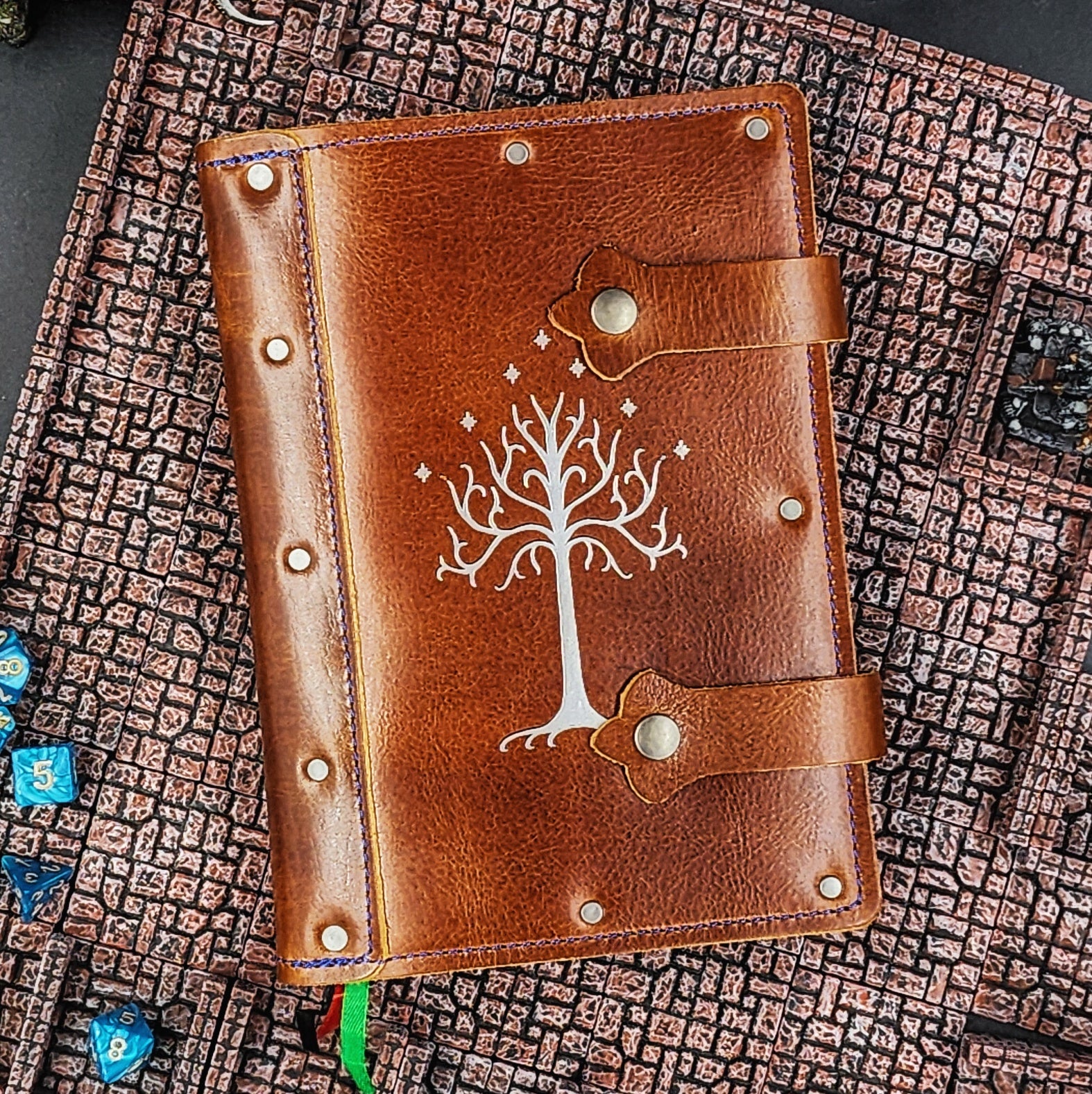 Handmade A5 leather adventure journal with hand-gilded White Tree of Gondor design by Grimbeard Leather