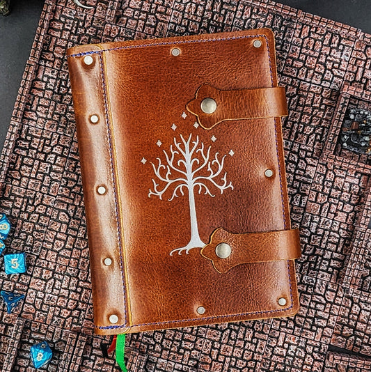 Handmade A5 leather adventure journal with hand-gilded White Tree of Gondor design by Grimbeard Leather