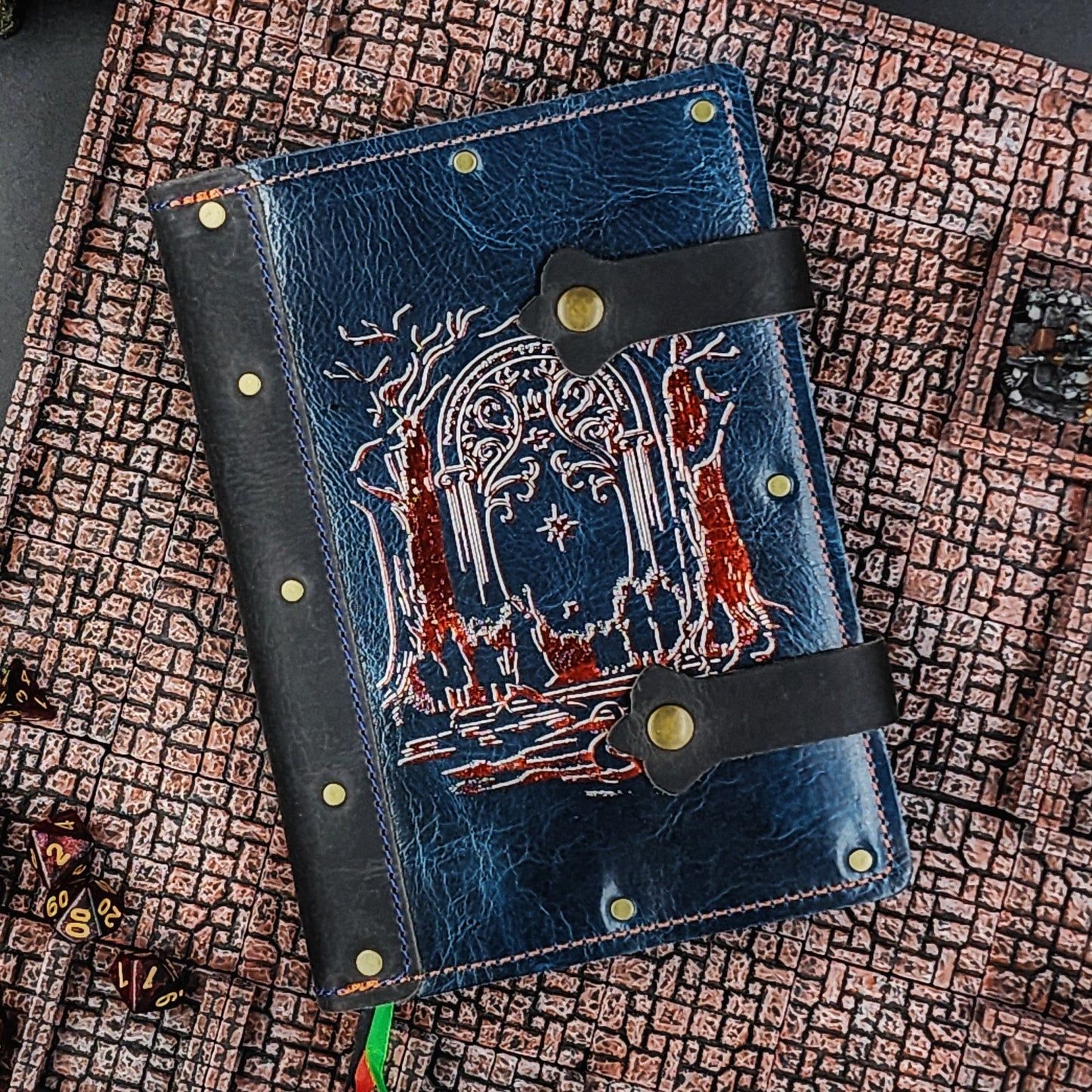 Handmade A5 leather adventure journal with hand-gilded Doors of Durin and Fellowship of the Ring silhouette design by Grimbeard Leather