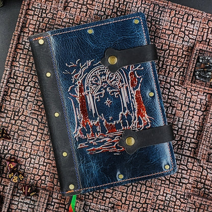 Handmade A5 leather adventure journal with hand-gilded Doors of Durin and Fellowship of the Ring silhouette design by Grimbeard Leather