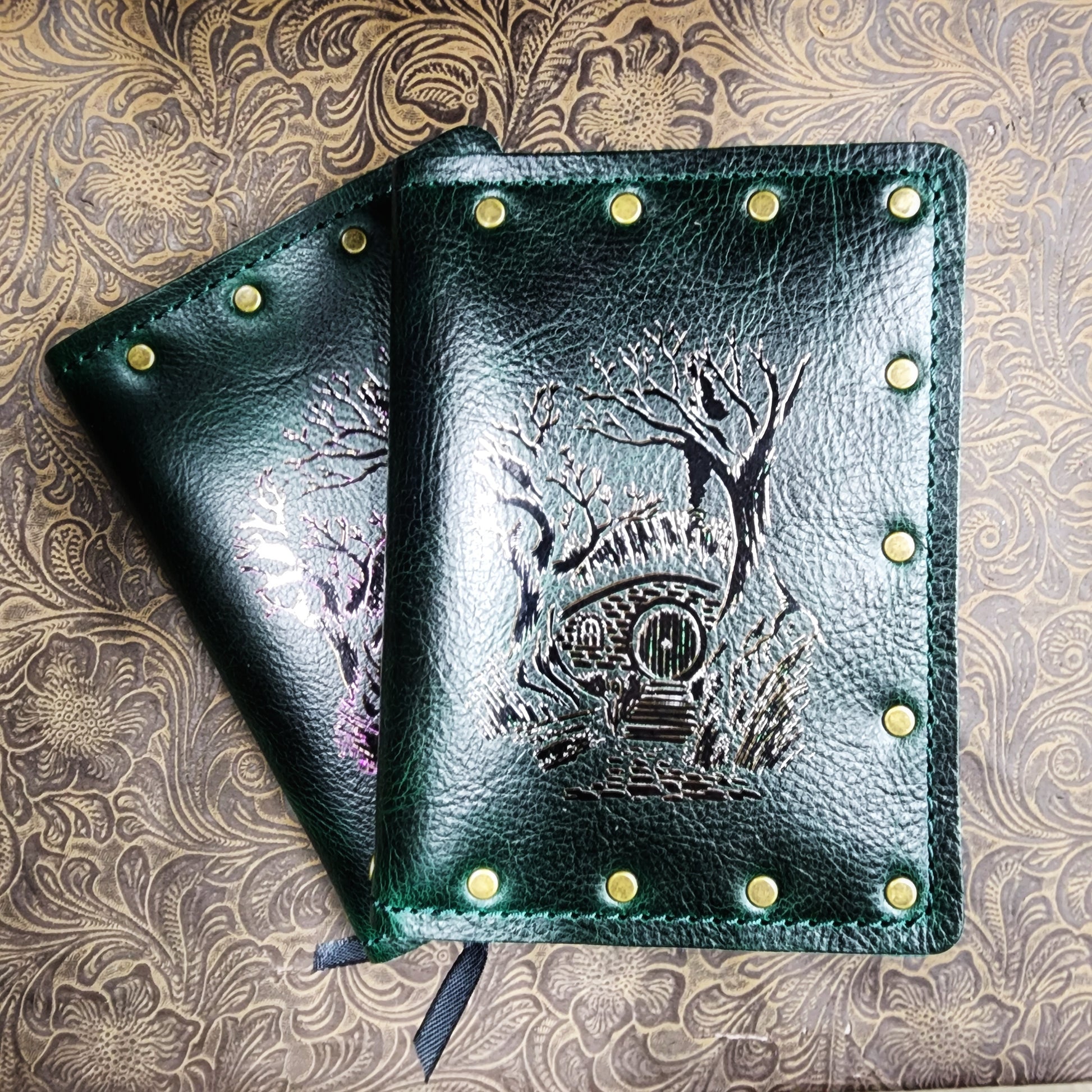 Custom handmade leather pocket journal with Bilbo's Hobbit hole and Bag End inspired design by Grimbeard Leather
