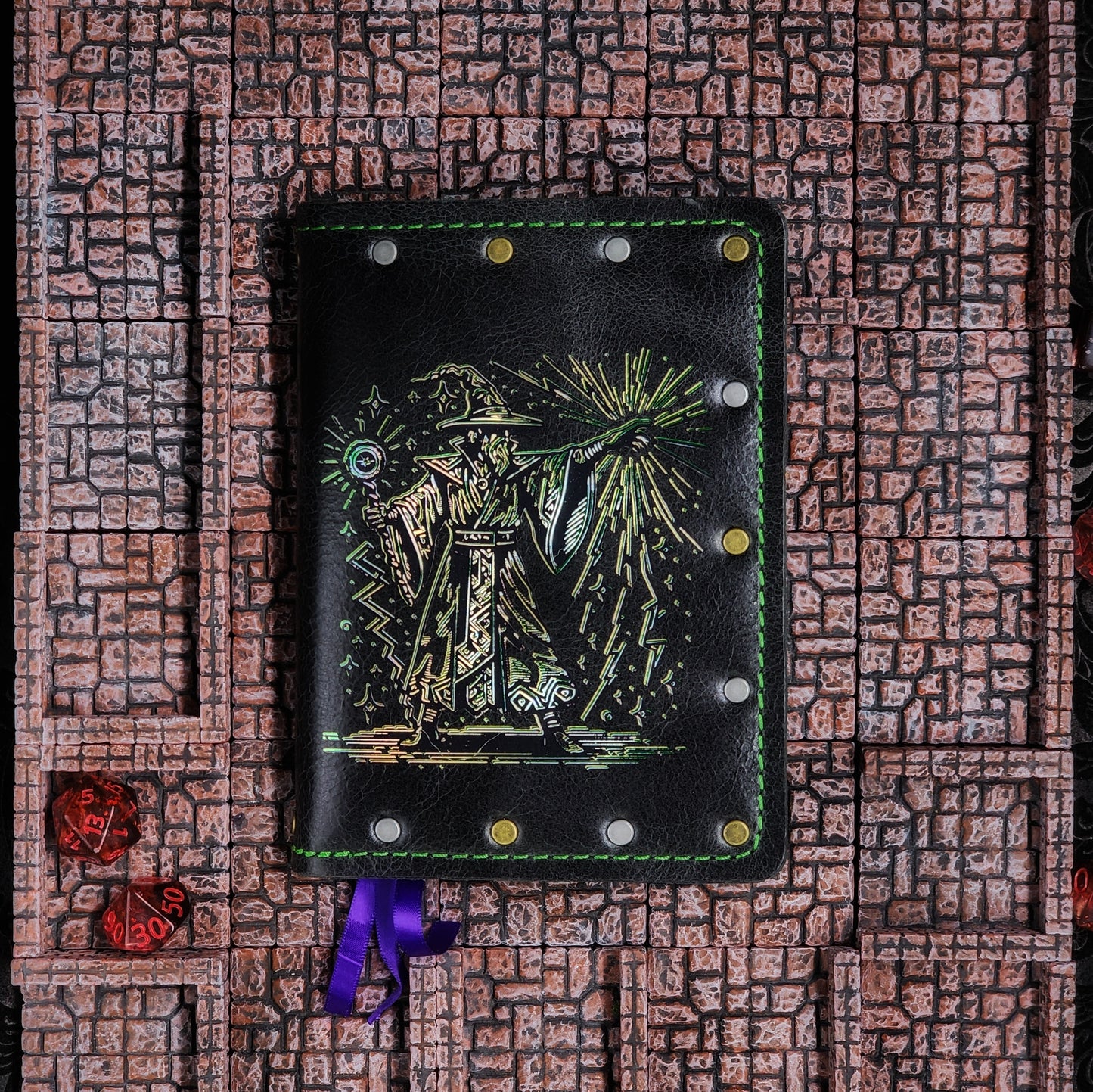 Handmade deep green leather pocket journal with 80's Wizard foil design by Grimbeard Leather
