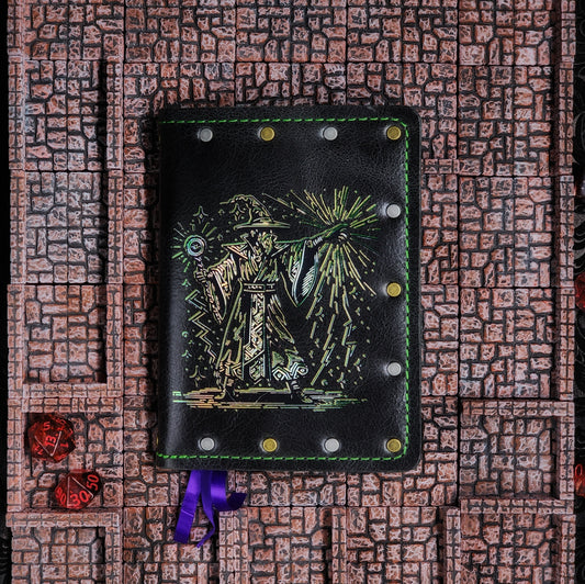 Handmade deep green leather pocket journal with 80's Wizard foil design by Grimbeard Leather
