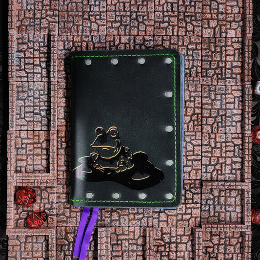 Custom handmade leather pocket journal with Futurama Hypnotoad design and gilded hypnotic eyes by Grimbeard Leather