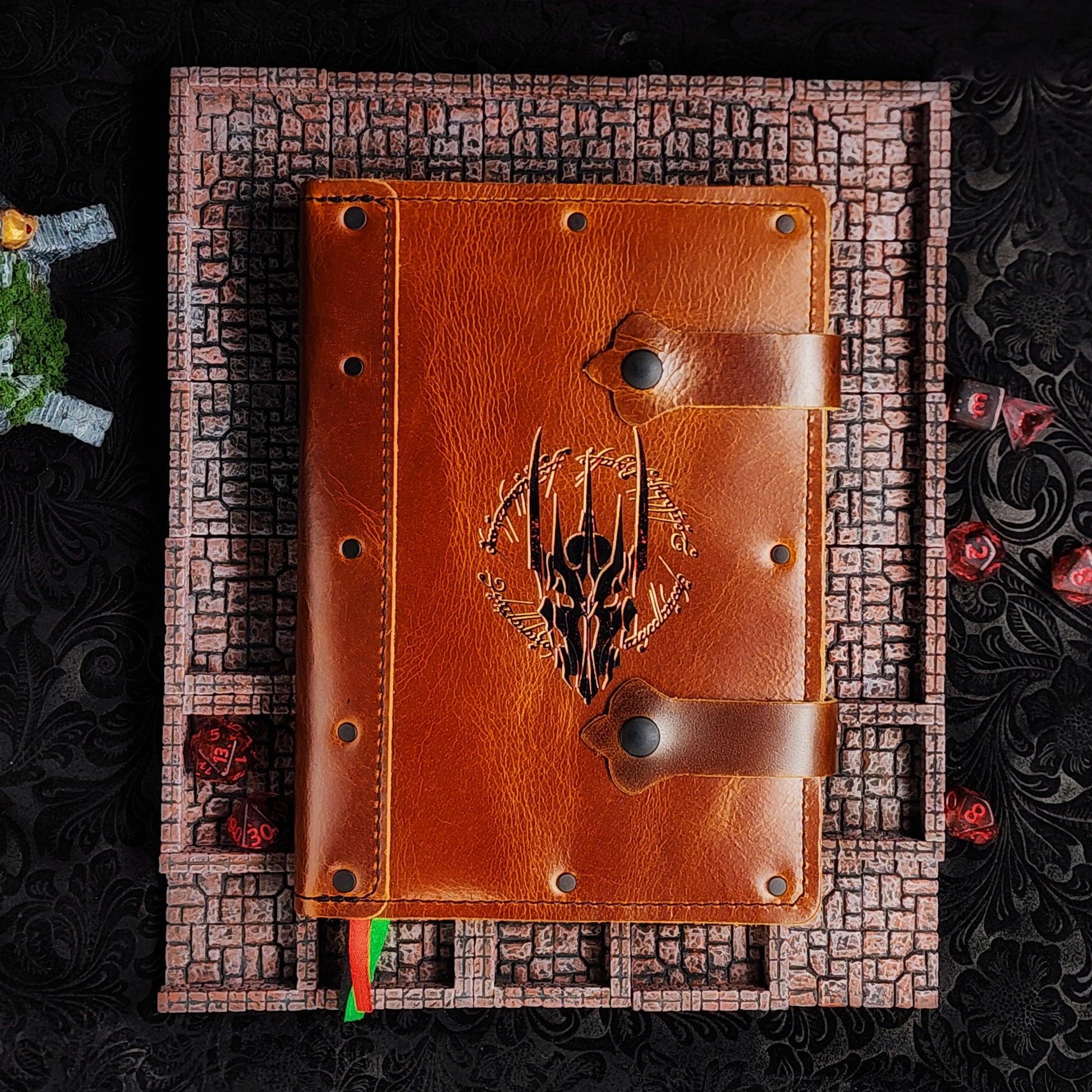Handmade A5 leather adventure journal with hand-gilded Sauron helmet and elvish ring script design by Grimbeard Leather