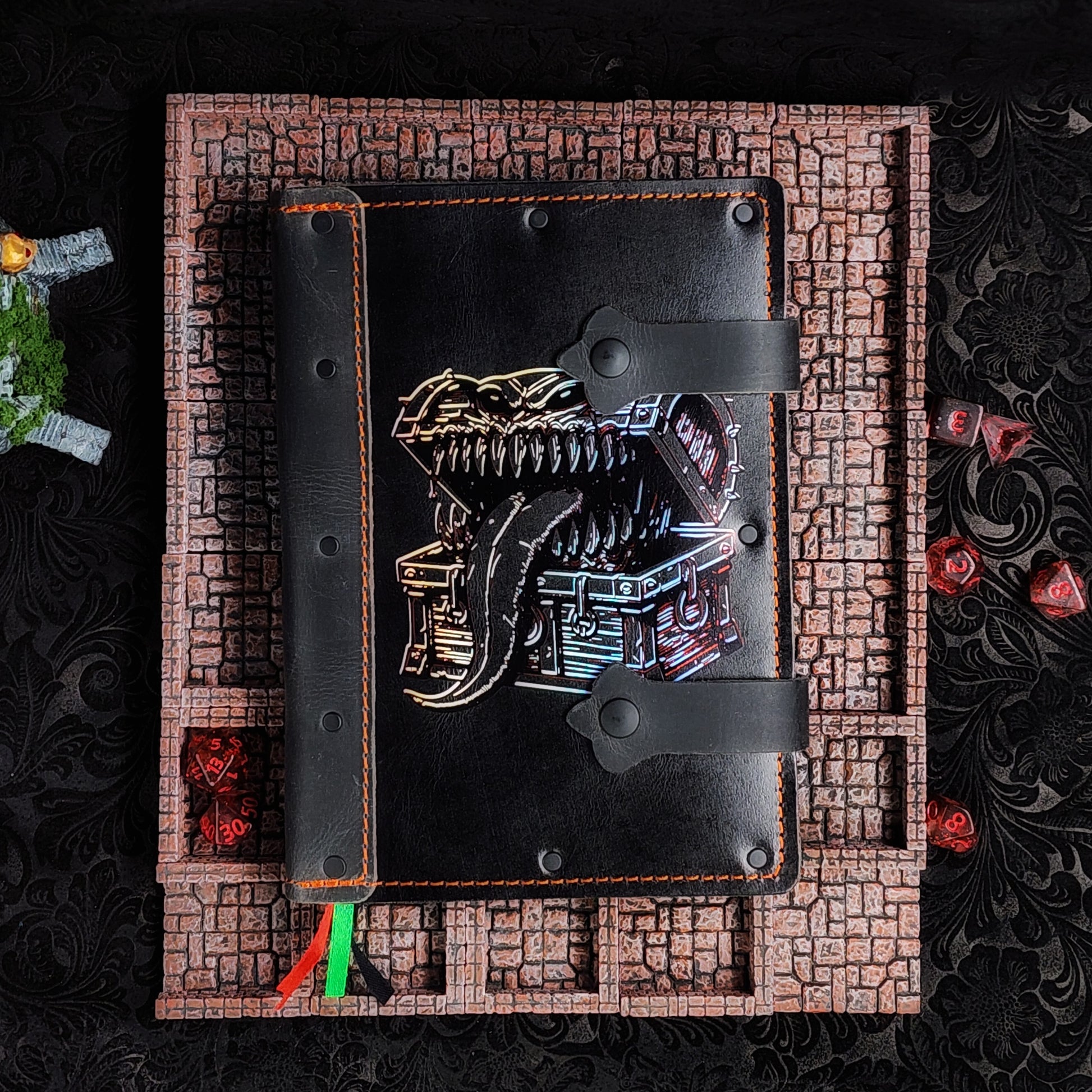 Handmade A5 leather adventure journal with hand-gilded treasure chest mimic monster design by Grimbeard Leather