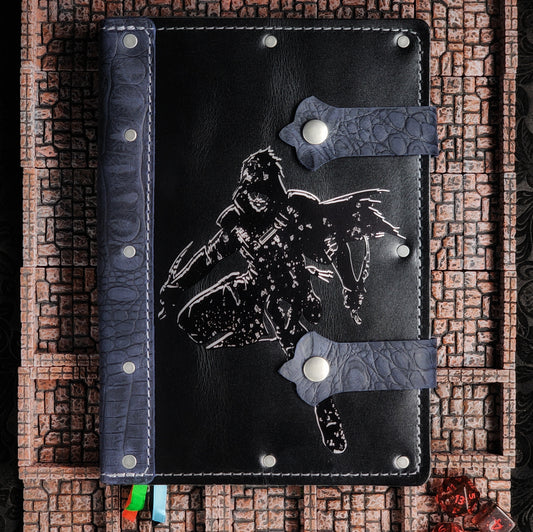 Handmade A5 leather adventure journal with hand-gilded hooded male rogue design by Grimbeard Leather