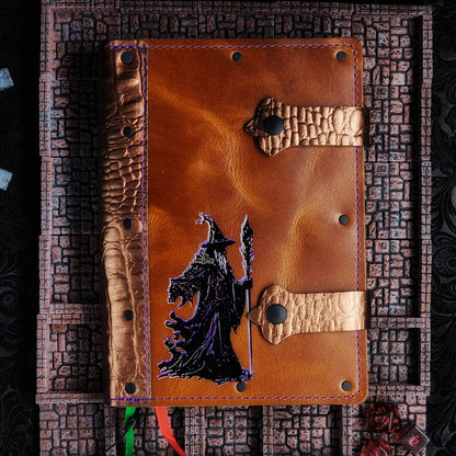 Handmade A5 leather adventure journal with hand-gilded original design of Grimbeard the Wizard with staff and tattered cloak by Grimbeard Leathe