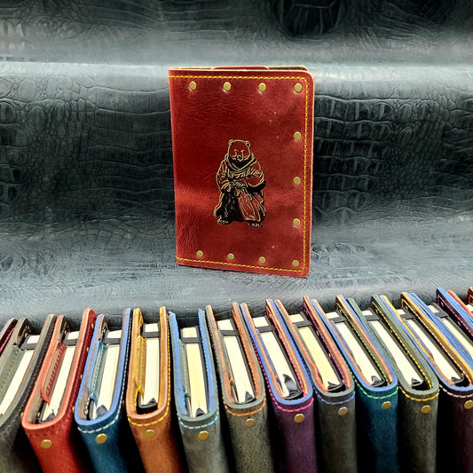 Custom handmade leather pocket journal with D&D inspired Polar Bear Monk character design by Grimbeard Leather